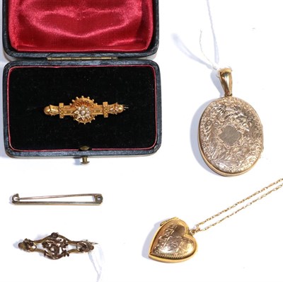 Lot 263 - A 9 carat gold Victorian pearl bar brooch, length 4.0cm; two locket pendants (one stamped...