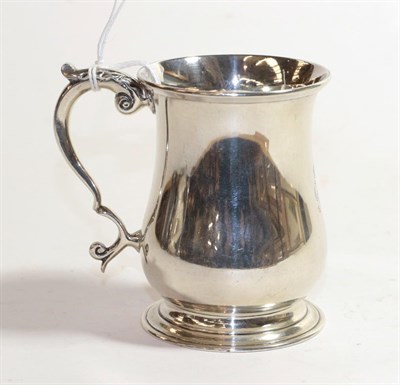 Lot 299 - A George V silver mug, by Stokes and Ireland Ltd., Chester, 1935, Retailed by Z. Barraclough...