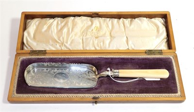 Lot 308 - A Victorian silver and ivory crumb-scoop, by Richard Martin and Ebenezer Hall, Sheffield, 1888,...