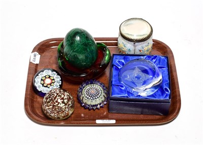 Lot 318 - Four various paperweights, including two millefiore examples, a large Malachite egg, glass ash...