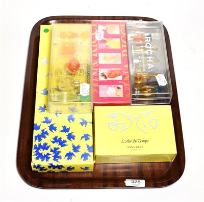 Lot 328 - Three Nina Ricci boxed gift sets, Rochas and Lalique gifts sets in perspex cases (5)