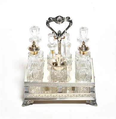 Lot 340 - A Victorian Elkington silver plated seven bottle cruet stand, date code for 1876, rectangular...