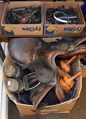 Lot 344 - A leather saddle, horse tack, riding boots and trees