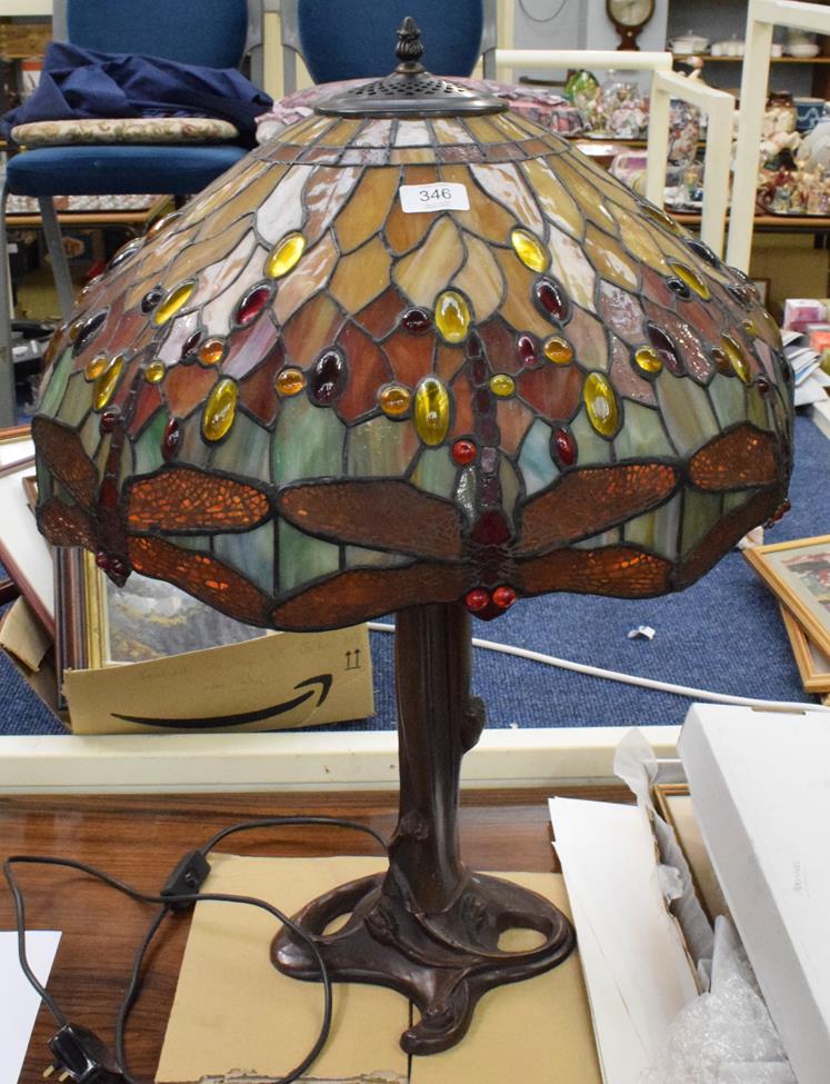 Lot 346 - A large Tiffany style table lamp with shade decorated with dragon flies