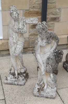 Lot 1109 - Two weathered composition garden statues of classical maidens