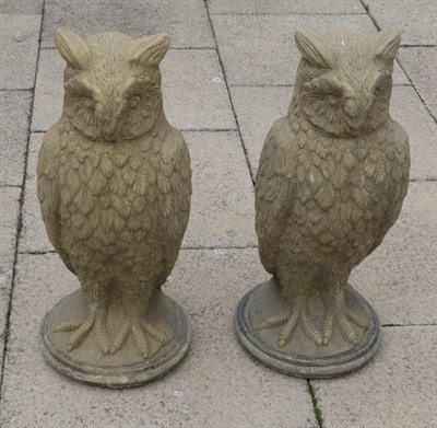 Lot 1127 - A pair of composition owls