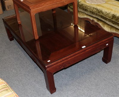 Lot 1160 - A large Chinese carved hardwood coffee table, 41cm by 149cm by 88cm