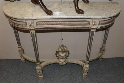 Lot 1178 - A marble topped silvered and painted console table in Louis XVI style, 94cm high by 131cm wide...