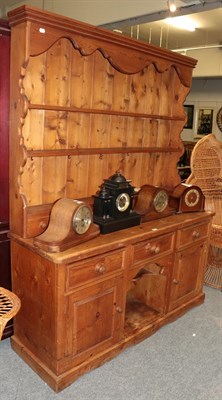 Lot 1181 - A country kitchen pine dresser and rack, 158cm by 201cm deep