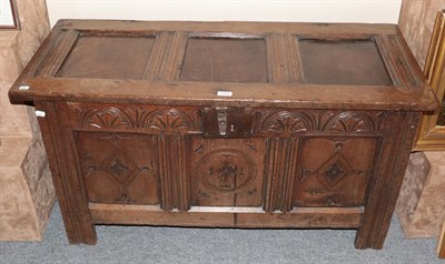 Lot 1182 - A late 18th century carved oak three-panel coffer, 59cm by 114cm by 50cm