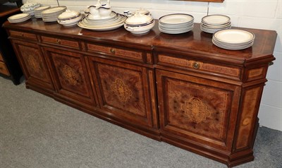 Lot 1209 - A reproduction inlaid walnut Italian four drawer breakfront sideboard (en suite with lot 1208)