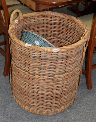 Lot 1212 - A wicker log basket and a blue painted basket