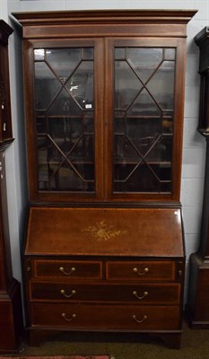 Lot 1221 - An Edwardian inlaid mahogany astragal glazed bureau bookcase, 225cm by 115cm by 48cm