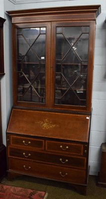 Lot 1222 - ~ A mahogany eight day longcase clock, early 19th century, arch painted dial unsigned