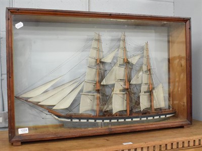 Lot 1224 - A cased model of a boat, glazed