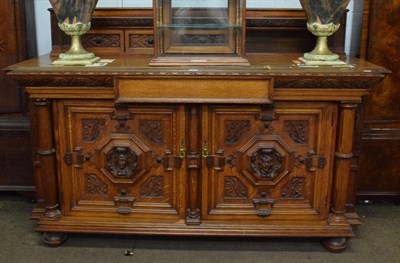 Lot 1226 - A Victorian oak breakfront sideboard with ornate carving