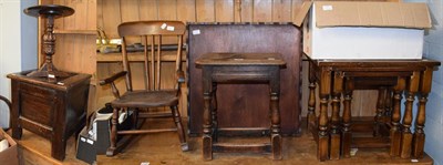 Lot 1239 - A nest of oak tables; an oak circular table; a child's rocking chair; an oak joint stool; an...