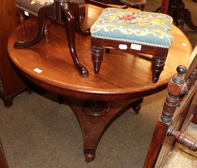 Lot 1244 - A md 19th century mahogany circular top breakfast table with faceted tapering standard on a...