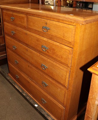 Lot 1250 - An early 20th century oak chest of drawers two short over four long, 134cm by 139cm by 56cm