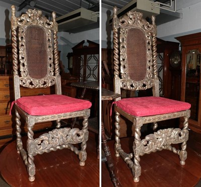 Lot 1259 - A pair of 17th century cane back hall chairs, later gilded