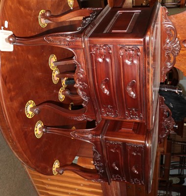 Lot 1262 - A pair of 20th century carved two drawer hardwood bedside tables, 80cm by 51cm by 45cm each