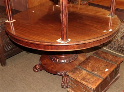 Lot 1265 - A Victorian mahogany pedestal breakfast table, the moulded circular top above a substantial...