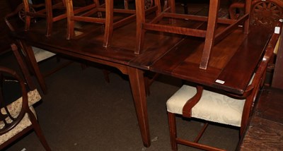 Lot 1268 - A Provincial draw leaf farmhouse dining table, possibly French, 79cm by 280cm (extended) by 85cm