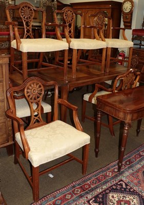 Lot 1269 - A set of eight mahogany armchairs, of recent date, with flower bell carved top rails above acanthus