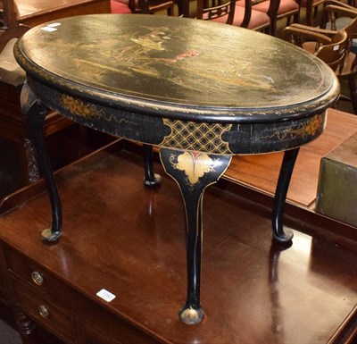 Lot 1283 - A 1920s black lacquer Chinoiserie coffee table, 46cm by 74cm by 48cm