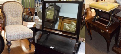 Lot 1284 - A George III mahogany two drawer low boy, circa 1780, with two drawers above an arched apron,...