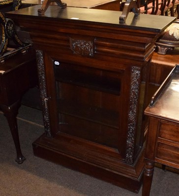 Lot 1285 - A 19th century carved rosewood pier cabinet, possibly Irish, 105cm by 89cm by 31cm