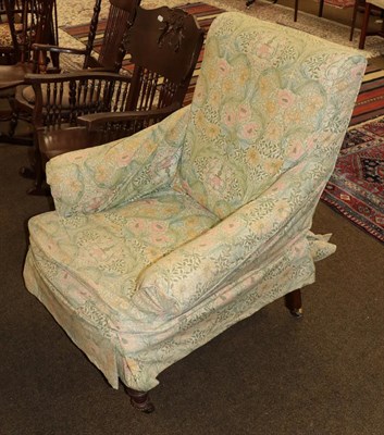 Lot 1294 - A Victorian walnut framed armchair, circa 1870, with removable floral cover, on turned forelegs...