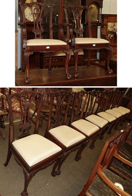 Lot 1296 - A set of ten reproduction dining chairs including two carvers