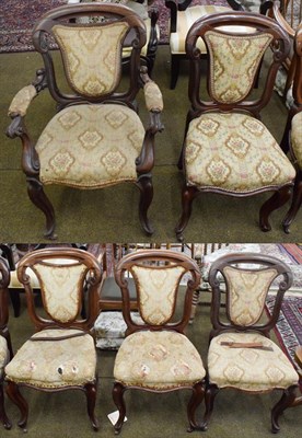 Lot 1310 - A set of five Victorian carved mahogany dining chairs, including one carver