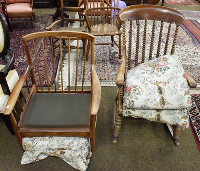 Lot 1312 - A 19th century mahogany rocking chair, with bobbin turned supports, together with a 1970s teak...