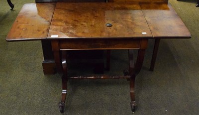 Lot 1314 - A 19th century mahogany drop leaf occasional table on shaped supports joined by a turned streacher