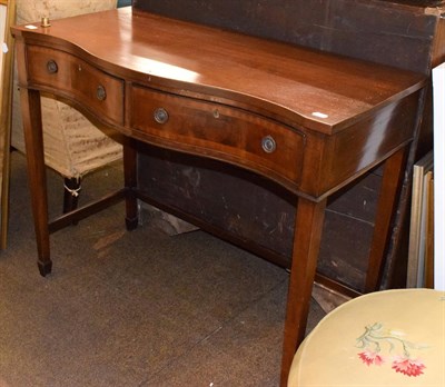 Lot 1322 - A mahogany serpentine fronted two drawer side table