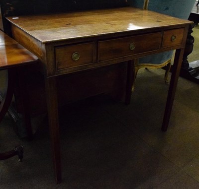 Lot 1323 - A George III mahogany side table, fitted with three frieze drawers