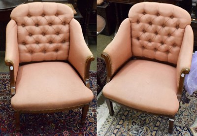 Lot 1335 - A pair of Edwardian button backed armchairs