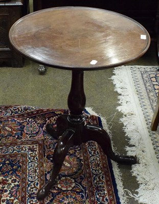 Lot 1336 - A 19th century mahogany tripod table with circular dish top