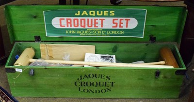 Lot 1338 - A Jaques croquet set in a green stained pine box