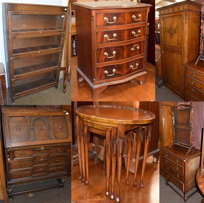 Lot 1363 - A 1920s oak single wardrobe and an oak bureau of similar taste, an oak four height chest, a...