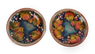 Lot 2000 - William Moorcroft (1872-1945): A Flambé Leaf and Grape Pattern Dishes, impressed facsimile...