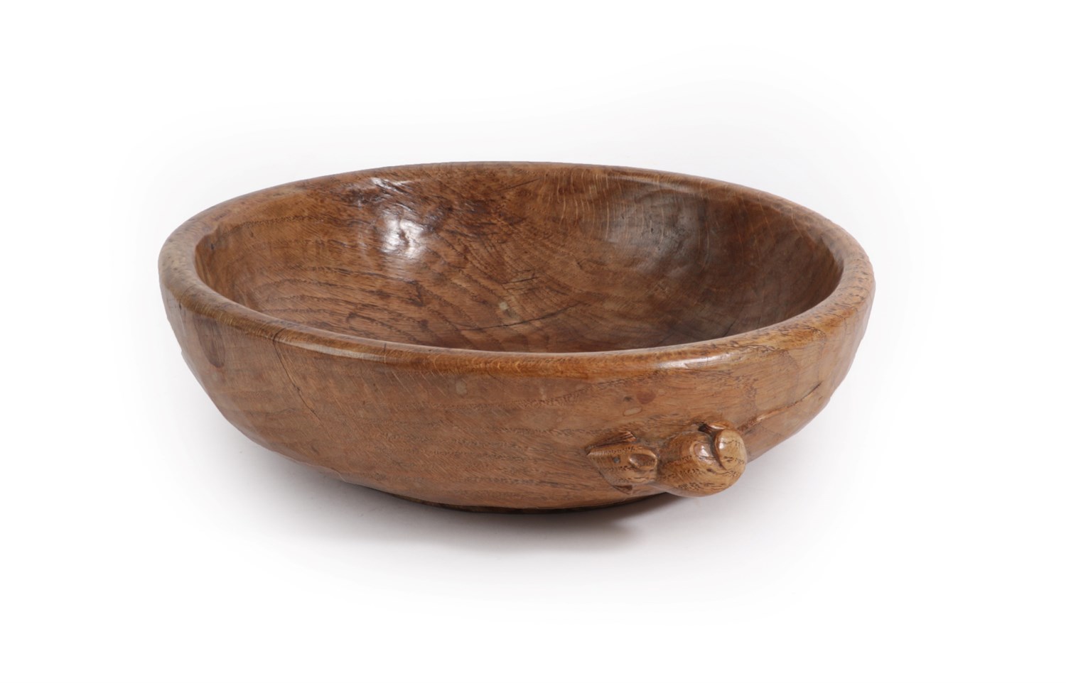 Lot 2047 - Robert Mouseman Thompson (1876-1955): An English Oak Circular Fruit Bowl, circa 1930s, tooled...