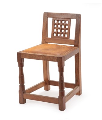 Lot 2051 - Robert Mouseman Thompson (1876-1955): An English Oak Low Lattice Back Chair, 1940's/50's, with...