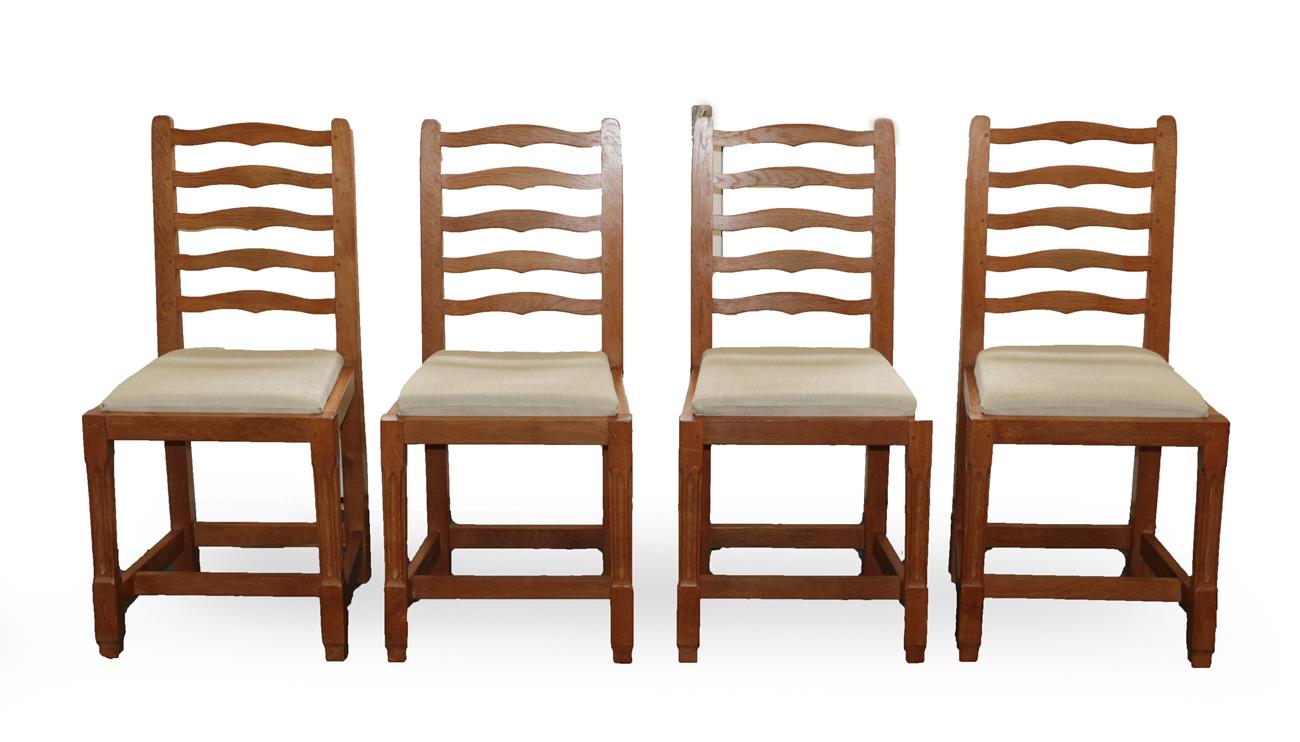 Lot 2076 - Cat and Mouseman: A Set of Four Lyndon Hammell (Harmby) English Oak Ladder Back Dining Chairs,...
