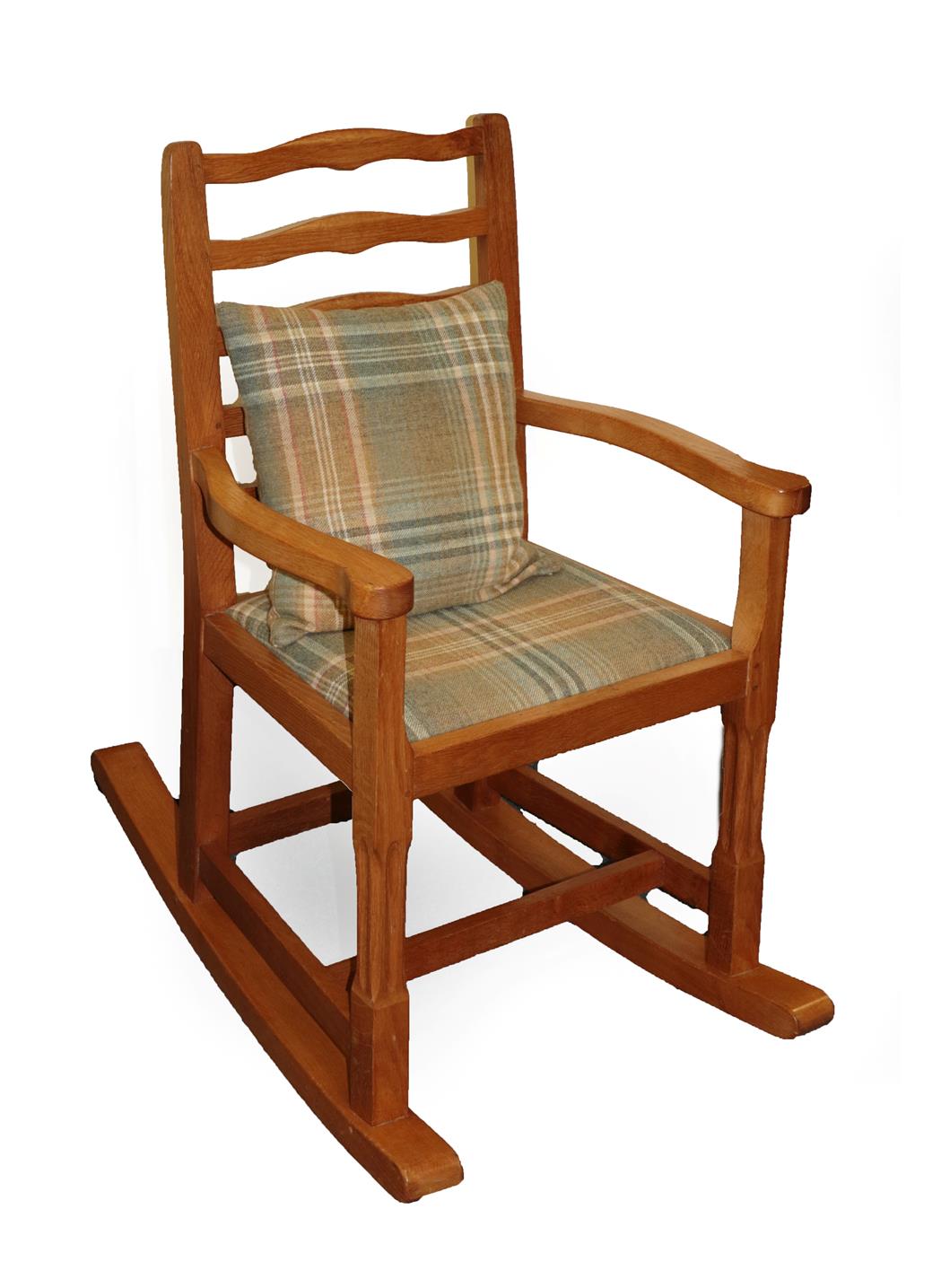 Lot 2076 - Cat and Mouseman: A Lyndon Hammell (Harmby) English Oak Ladder Back Rocking Chair, drop-in seat, on