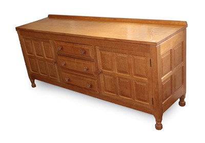 Lot 2085A - Foxman: A Don Craven (Boroughbridge): An English Oak Panelled Sideboard, with raised upstand, above