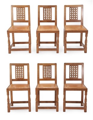 Lot 2089 - A Set of Six Sid Pollard of Thirsk English Oak Lattice Back Dining Chairs, with nailed tan hide...