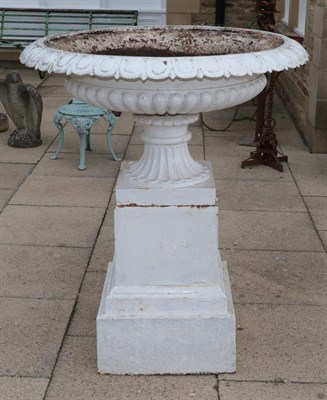Lot 1100A - A large Victorian white painted cast iron garden urn decorated with egg and dart borders and raised